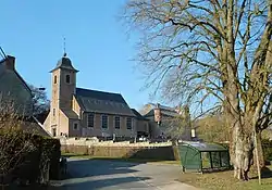 Tavier, church (left) and fortified farmstead (right)