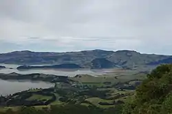 Looking northeast, with Head of the Bay in the lower left of the picture and Te Wharae / Charteris Bay in the centre