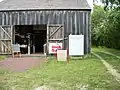 The c.1850-built Hay Barn in the back yard, which is now used to sell used books, records and other items.