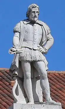 Statue atop the pediment of D. Maria II National Theatre