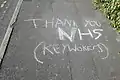 "Thank you NHS (Keyworkers)" chalked on a pavement in Weymouth