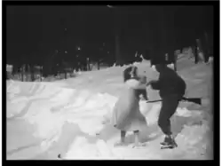 The girl meeting the figure in Roosevelt military attire