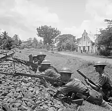 4/7th Rajputs in position along railway line at Bekasi, Java