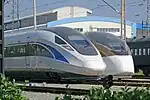 CRH-0208 and CRH-0507 in the National Railway Test Center, with old liveries and CRH branding.