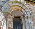 Doorway with carving including tympanum