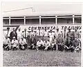 The Southwest Conference Press Tour circa 1970s. McLaughlin is in front row, second from right, in baseball cap.