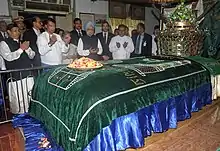 Prime Minister of India Manmohan Singh prays at the Mazar of Bahadur Shah Zafar, in Yangon, Myanmar