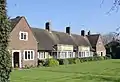 The Sampsons Almshouses, West Street, Farnham by Harold Falkner