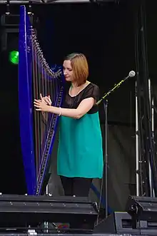 Newton performing with The Shee, Cropredy Festival, 2011