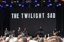 The Twilight Sad performing live at Hyde Park, London in 2018.Left to right: MacFarlane, Graham, Schultz, Smith and Docherty.