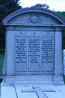 tombstone with inscriptions to Wyndham and both his wives, giving dates of birth and death