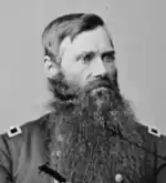 young officer with long beard