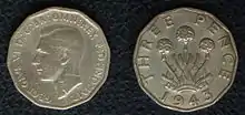 A 1943 threepenny bit (reverse portrays Thrift)