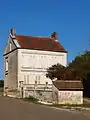 old house in front of the lavoir