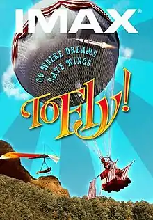 A hot-air balloon, hang-glider, and rocket above a forested rocky terrain. The tagline is "Go where dreams have wings." written in the Action Is font.