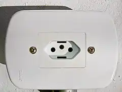 A 20 A Brazilian socket based on the IEC 60906-1 standard.