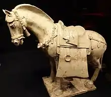 Horse with elaborate trappings,  early 600s