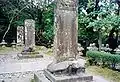 Stele standing in front of the grave