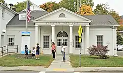 Town hall on Tinker Street (NY 212)