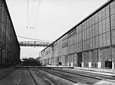 Steam locomotive on the transfer table between buildings in Santa Fe's San Bernardino, California shops in March 1943