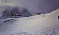 The Tre Cime during winter, with the Locatelli hut in the foreground.