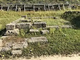 The aqueduct shown behind the Treasury of Cyrene, shored up by a metal framework