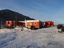 Photo of an outpost surrounded by snow.