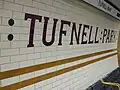 Tiling on the southbound platform.