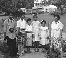 Young boys wearing traditional Tongan Tupenu