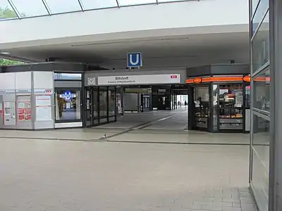 The entrance to trains and shopping mall