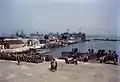 USS LST-314 alongside USS LST-374 undergoing preparation for the Normandy invasion in 1944