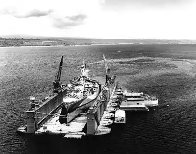 The ship on a floating dry dock for repairs