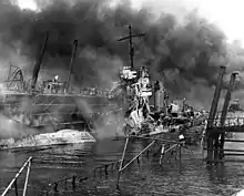 Wreckage of bombed YFD-2 and Shaw at Pearl Harbor