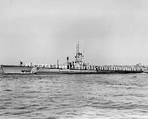 Threadfin's sailors line the deck, possibly at the naval base at Staten Island, N.Y., 22 September 1945.