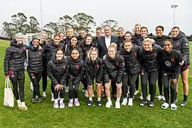 Thompson with the U.S. national team and Second Gentleman, Doug Emhoff, July 2023