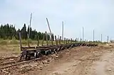 Railway log-cars