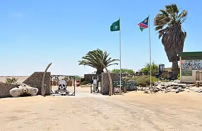 Ugabmund Gate (Ugab River Gate) of the Skeleton Coast National Park; note the skulls-and-crossbones in the gate