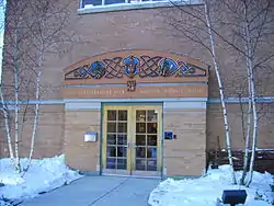 The Ukrainian National Museum featuring a bronze relief over the entrance.