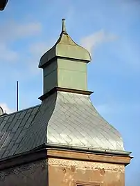 Detail of the frieze and the onion shaped spire