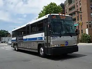 A Glen Oaks-bound QM5 bus at Union Turnpike and 164th Street.