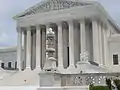 Lampstand (foreground) (1935), U.S. Supreme Court Building.