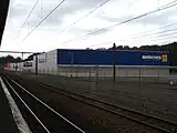 Neighbouring big-format retailers at Upper Hutt railway station, from foreground to background: Briscoes, Wellington Beds, Big Save Furniture, Mitre 10 Mega