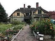 Carriage house and stable for Lucian Sharpe, Providence, Rhode Island, 1885.