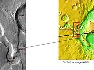 The long channel Nirgal Vallis is shown where it connects to Uzboi Vallis.  The crater Luki is 21 km in diameter.  Picture taken by THEMIS.