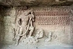 Vishnu in the form of Varaha, Udayagiri caves, circa 400 CE. In front, probable relief of Chandragupta II (380–415 CE) kneeling, paying homage to Varaha.