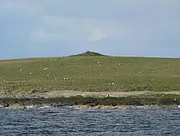 Veltie Skerry and the cairn on the Holm of Huip