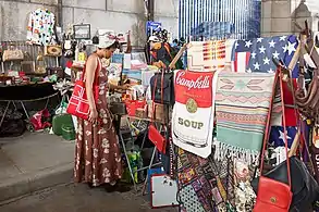 Vendor display at the Brooklyn Flea in DUMBO archway