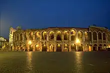 The outside of a stone amphitheater.