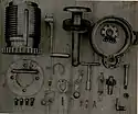 A disassembled breech mechanism.