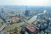 Aerial view of the Saigon bank building (bottom center) and the Rạch Bến Nghé canal